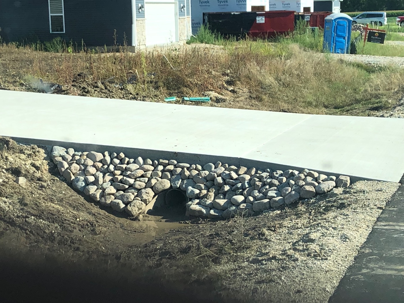 Concrete driveway with drainage culvert, Washington County, WI